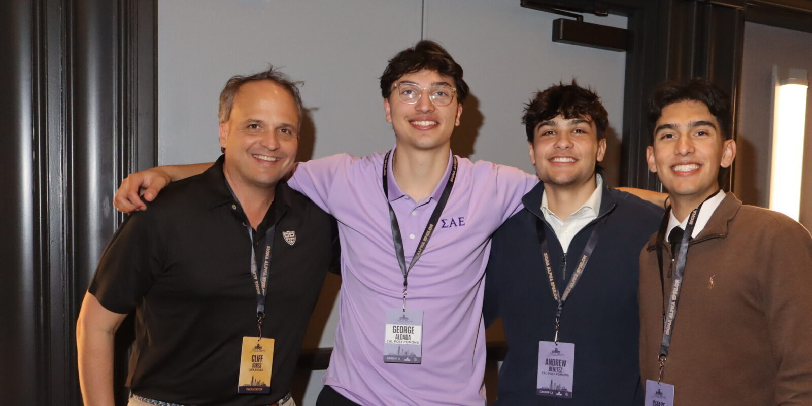group photo of 4 brothers at career networking event