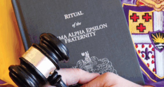Ritual of the SAE fraternity book with gavel
